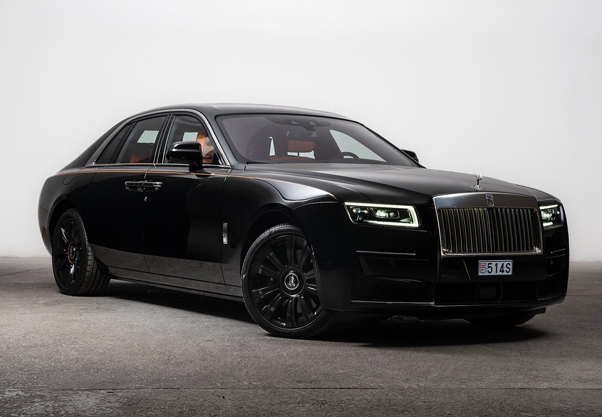 A sleek black Rolls-Royce Ghost car